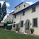 An entrance to an Italian villa